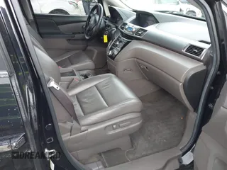 2012 Honda Odyssey EX-L with VIN 5FNRL5H64CB142247, listed as a IAAI auction lot 41722015 with 179,637 mi miles and . Bid and sale history available at carsss.com. Image 5.