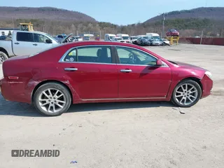 2009 Chevrolet Malibu LTZ with VIN 1G1ZK57709F174297, listed as a IAAI auction lot 41756235 with 146,455 mi miles and . Bid and sale history available at DreamBid. Image 6.