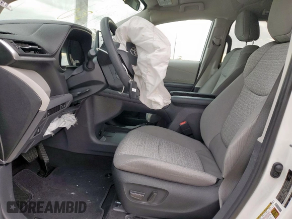 2024 Toyota Sienna LE with VIN 5TDKSKFC9RS145497, listed as a Copart auction lot 55567725 with 22,774 mi miles and Salvage title. Bid and sale history available at DreamBid. Image 7.