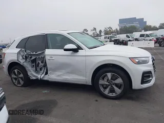 2024 Audi Q5 Premium Plus z VIN WA1BBAFY9R2044435, wystawiony jako IAAI lot #41210271 z przebiegiem 8 906 mil mil oraz . Historia ofert i sprzedaży dostępna na DreamBid. Obrazek 13.