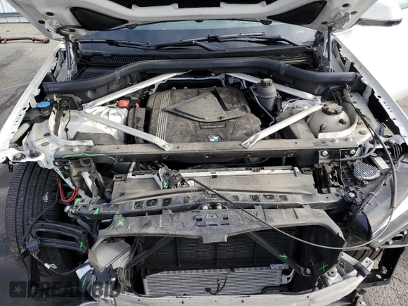 2020 BMW X5 xDrive40i with VIN 5UXCR6C04L9B36134, listed as a Copart auction lot 52220665 with 51,285 mi miles and Salvage title. Bid and sale history available at DreamBid. Image 12.
