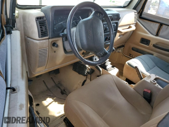 2000 Jeep Wrangler Sahara with VIN 1J4FA59S8YP721771, listed as a Copart auction lot 56924475 with 175,456 mi miles and Clean title. Bid and sale history available at DreamBid. Image 8.