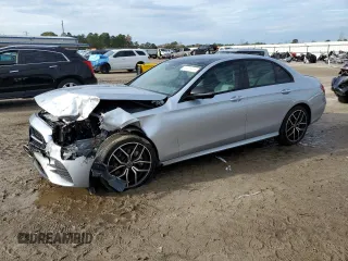 2022 Mercedes-Benz E-Class E 350 with VIN W1KZF8DB8NB075739, listed as a Copart auction lot 84028124 with 23,405 mi miles and Salvage Title. Bid and sale history available at carsss.com. Image 1.
