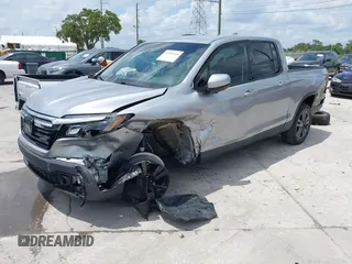 2020 Honda Ridgeline Sport with VIN 5FPYK3F19LB024180, listed as a IAAI auction lot 42399195 with 42,129 mi miles and . Bid and sale history available at DreamBid. Image 2.