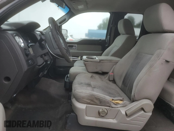 2009 Ford F-150 STX with VIN 1FTRX12809KB12665, listed as a Copart auction lot 42559065 with 300,074 mi miles and Salvage Title. Bid and sale history available at DreamBid. Image 7.