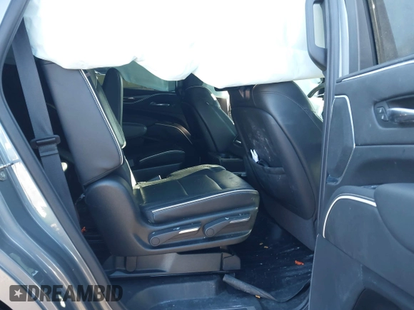 2021 Cadillac Escalade Premium Luxury z VIN 1GYS4CKL2MR231788, wystawiony jako IAAI lot #41630686 z przebiegiem 56 672 mil mil oraz . Historia ofert i sprzedaży dostępna na DreamBid. Obrazek 8.
