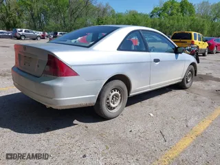 2001 Honda Civic LX with VIN 1HGEM22561L123530, listed as a IAAI auction lot 42092186 with 190,321 mi miles. Bid and sale history available at carsss.com. Image 4.