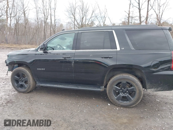 2018 Chevrolet Tahoe LT z VIN 1GNSKBKC7JR276427, wystawiony jako IAAI lot #41977418 z przebiegiem 152 007 mil mil oraz . Historia ofert i sprzedaży dostępna na DreamBid. Obrazek 14.