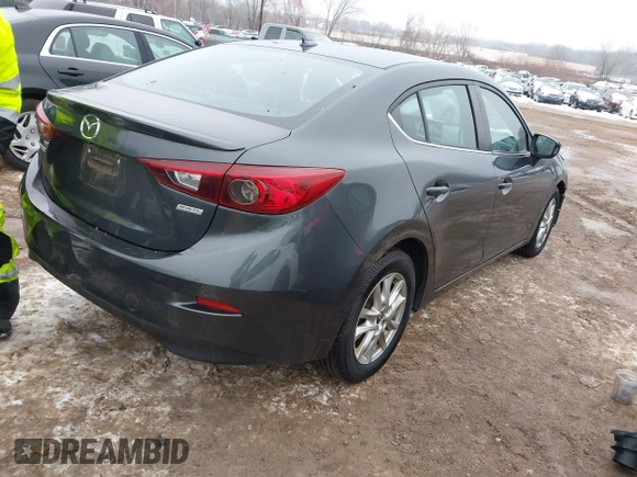 2015 Mazda 3 i Grand Touring with VIN 3MZBM1W72FM165672, listed as a IAAI auction lot 41177910 with 125,713 mi miles and . Bid and sale history available at DreamBid. Image 4.