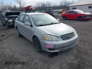 2004 Toyota Corolla CE with VIN 1NXBR32E74Z329751, listed as a IAAI auction lot 41489611 with 128,471 mi miles. Bid and sale history available at carsss.com. Image 1.