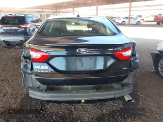 2015 Ford Fusion SE with VIN 3FA6P0H78FR306661, listed as a IAAI auction lot 41642086 with 158,349 mi miles. Bid and sale history available at carsss.com. Image 6.