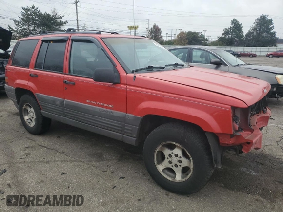 1996 Jeep Grand Cherokee Laredo with VIN 1J4GZ58S7TC292217, listed as a Copart auction lot 80757904 with 156,041 mi miles and Salvage Title. Bid and sale history available at carsss.com. Image 4.