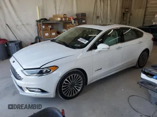 2017 Ford Fusion Hybrid Titanium with VIN 3FA6P0RU3HR400034, listed as a Copart auction lot 62689795 with 109,118 mi miles and Salvage title. Bid and sale history available at DreamBid. Image 1.