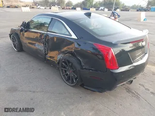 2018 Cadillac ATS Coupe Luxury RWD with VIN 1G6AB1RX0J0164048, listed as a IAAI auction lot 41446417 with 31,691 mi miles. Bid and sale history available at carsss.com. Image 3.