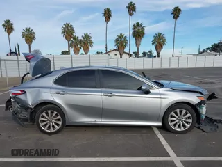 2019 Toyota Camry LE with VIN 4T1B11HK7KU803624, listed as a IAAI auction lot 41589107 with 169,863 mi miles and . Bid and sale history available at DreamBid. Image 13.