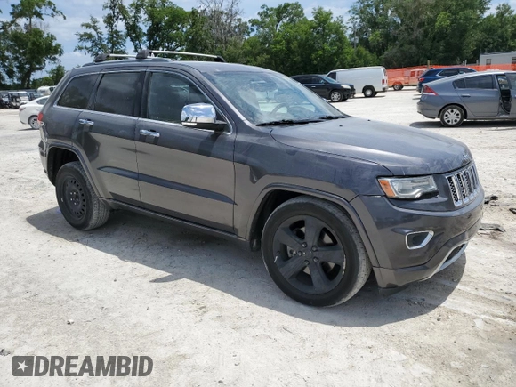 2014 Jeep Grand Cherokee Overland with VIN 1C4RJFCT7EC182234, listed as a Copart auction lot 54754465 with 185,658 mi miles and Salvage Title. Bid and sale history available at DreamBid. Image 4.