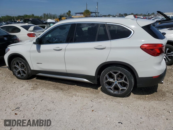 2018 BMW X1 sDrive28i with VIN WBXHU7C38J5H44459, listed as a Copart auction lot 49107553 with 96,494 mi miles and . Bid and sale history available at DreamBid. Image 2.
