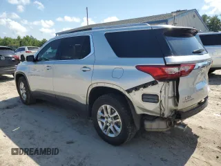2018 Chevrolet Traverse LT Cloth with VIN 1GNERGKW7JJ282002, listed as a Copart auction lot 61564495 with 105,048 mi miles and Salvage title. Bid and sale history available at DreamBid. Image 2.