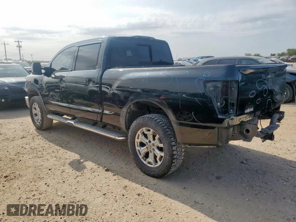 2016 Nissan Titan Platinum Reserve with VIN 1N6BA1F42GN506140, listed as a Copart auction lot 57171395 with 141,295 mi miles and Salvage title. Bid and sale history available at DreamBid. Image 2.
