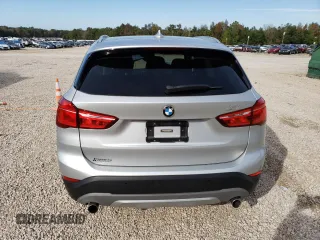 2017 BMW X1 sDrive28i with VIN WBXHU7C30H5H37516, listed as a Copart auction lot 68677332 with 0 mi miles. Bid and sale history available at carsss.com. Image 6.