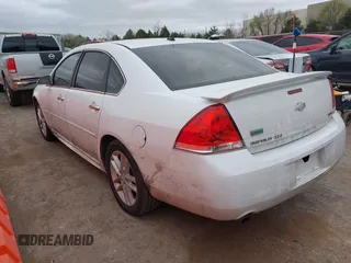 2013 Chevrolet Impala LTZ with VIN 2G1WC5E34D1152402, listed as a IAAI auction lot 41838035 with 214,088 mi miles and . Bid and sale history available at DreamBid. Image 3.