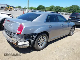 2014 Chrysler 300 with VIN 2C3CCAAG8EH264595, listed as a IAAI auction lot 42076996 with 101,659 mi miles and . Bid and sale history available at DreamBid. Image 4.