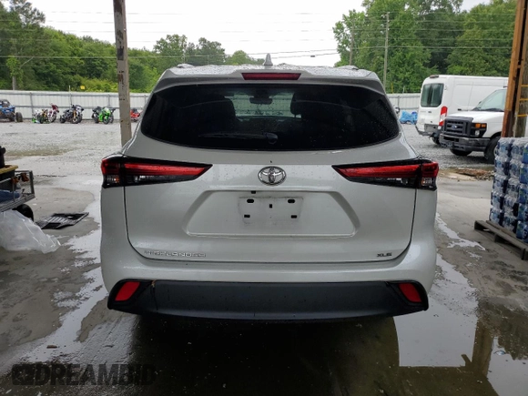 2023 Toyota Highlander L with VIN 5TDKDRAH8PS023507, listed as a Copart auction lot 58684065 with 50,294 mi miles and Salvage title. Bid and sale history available at DreamBid. Image 6.