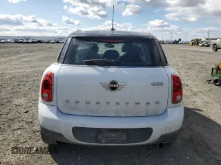 2015 MINI Countryman with VIN WMWZB3C50FWR44801, listed as a Copart auction lot 51957715 with 69,537 mi miles and Salvage Title. Bid and sale history available at DreamBid. Image 6.