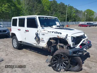 2017 Jeep Wrangler Unlimited Rubicon with VIN 1C4BJWFG9HL695361, listed as a IAAI auction lot 42010655 with 65,536 mi miles and . Bid and sale history available at DreamBid. Image 1.