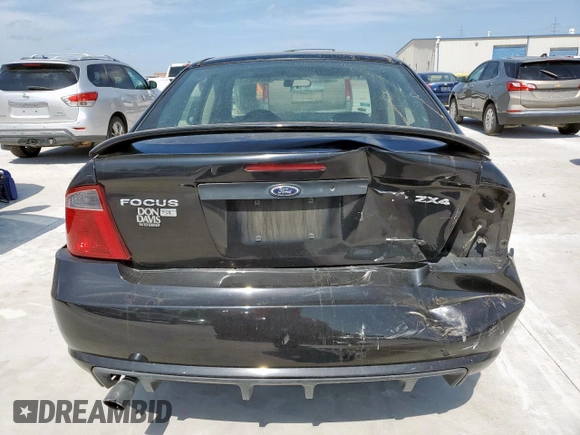 2006 Ford Focus S z VIN 1FAFP34N26W145565, wystawiony jako Copart lot #60091675 z przebiegiem 251 850 mil mil oraz Szkoda całkowita • Salvage title. Historia ofert i sprzedaży dostępna na DreamBid. Obrazek 6.