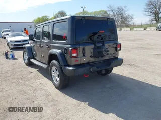 2019 Jeep Wrangler Unlimited Sport S with VIN 1C4HJXDG0KW541940, listed as a IAAI auction lot 42100255 with 68,309 mi miles and . Bid and sale history available at DreamBid. Image 3.