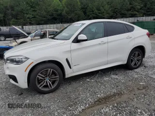 2015 BMW X6 xDrive50i z VIN 5UXKU6C54F0R33513, wystawiony jako Copart lot #58395265 z przebiegiem 160 049 mil mil oraz Czysty tytuł • Clean title. Historia ofert i sprzedaży dostępna na DreamBid. Obrazek 1.