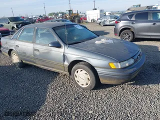 1993 Ford Taurus GL with VIN 1FALP5240PG327124, listed as a IAAI auction lot 42074204 with 27,681 mi miles. Bid and sale history available at carsss.com. Image 1.