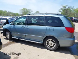 2009 Toyota Sienna XLE with VIN 5TDZK22C99S239755, listed as a IAAI auction lot 42096411 with 214,983 mi miles. Bid and sale history available at carsss.com. Image 15.