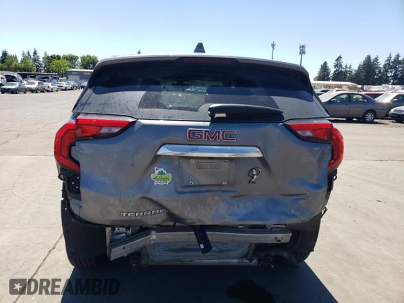 2019 GMC Terrain SLE with VIN 3GKALMEV2KL249787, listed as a Copart auction lot 63664424 with 100,522 mi miles and Salvage title. Bid and sale history available at DreamBid. Image 6.