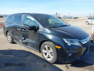 2018 Honda Odyssey EX-L with VIN 5FNRL6H73JB039428, listed as a IAAI auction lot 41813110 with 132,894 mi miles. Bid and sale history available at carsss.com. Image 1.
