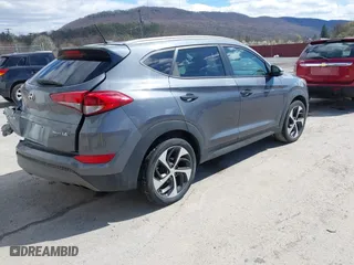 2016 Hyundai Tucson Sport with VIN KM8J33A2XGU022633, listed as a IAAI auction lot 41990348 with 73,395 mi miles. Bid and sale history available at carsss.com. Image 4.