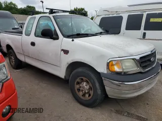 1999 Ford F-250 with VIN 1FTPX27L2XKA25342, listed as a Copart auction lot 53118315 with 384,756 mi miles and Salvage title. Bid and sale history available at DreamBid. Image 4.