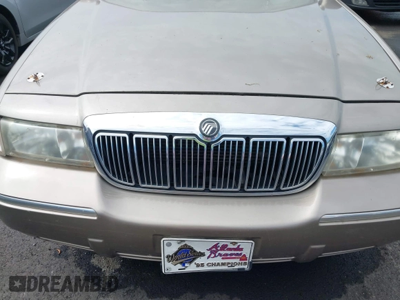 2001 Mercury Grand Marquis LS z VIN 2MEFM75W11X610723, wystawiony jako IAAI lot #42208567 z przebiegiem 190 397 mil mil oraz . Historia ofert i sprzedaży dostępna na DreamBid. Obrazek 6.