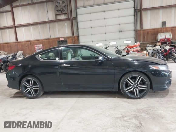 2016 Honda Accord Touring with VIN 1HGCT2B05GA002832, listed as a IAAI auction lot 42221520 with 217,435 mi miles and . Bid and sale history available at DreamBid. Image 13.