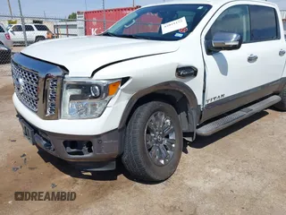 2017 Nissan Titan SV with VIN 1N6AA1E5XHN532587, listed as a IAAI auction lot 42019155 with 90,496 mi miles and . Bid and sale history available at DreamBid. Image 6.