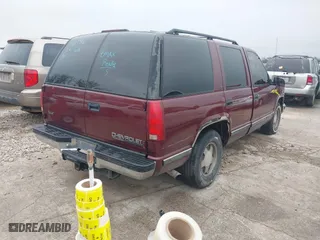 1999 Chevrolet Tahoe with VIN 1GNEC13R8XJ511786, listed as a IAAI auction lot 41538890 with 196,764 mi miles. Bid and sale history available at carsss.com. Image 4.
