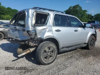 2010 Ford Escape XLS with VIN 1FMCU0C73AKA52802, listed as a Copart auction lot 60100185 with 141,541 mi miles and Clean title. Bid and sale history available at DreamBid. Image 3.