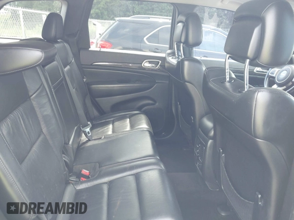 2011 Jeep Grand Cherokee Laredo with VIN 1J4RR4GG7BC701007, listed as a IAAI auction lot 42704995 with 145,956 mi miles and . Bid and sale history available at DreamBid. Image 8.