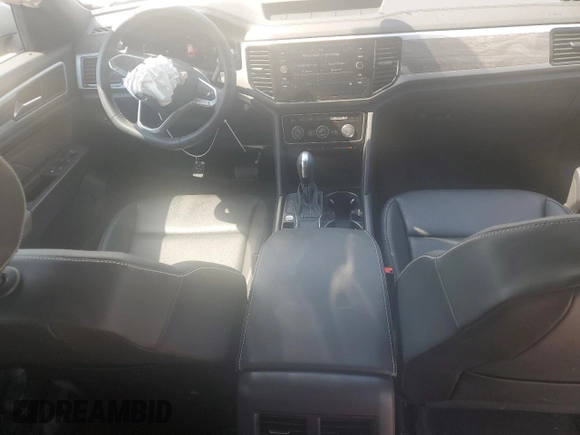 2023 Volkswagen Atlas SE z VIN 1V2WC2CA3PC219429, wystawiony jako Copart lot #54626654 z przebiegiem 12 371 mil mil oraz . Historia ofert i sprzedaży dostępna na DreamBid. Obrazek 8.