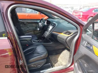 2016 Lincoln MKC Reserve z VIN 5LMCJ3D93GUJ20035, wystawiony jako IAAI lot #41898141 z przebiegiem 144 152 mil mil oraz . Historia ofert i sprzedaży dostępna na DreamBid. Obrazek 5.