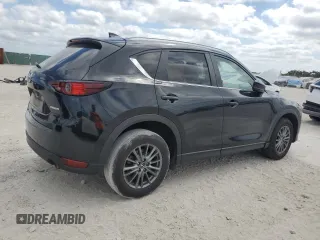 2021 Mazda CX-5 Touring z VIN JM3KFBCM8M1436782, wystawiony jako Copart lot #54144645 z przebiegiem 52 388 mil mil oraz Szkoda całkowita • Salvage title. Historia ofert i sprzedaży dostępna na DreamBid. Obrazek 3.