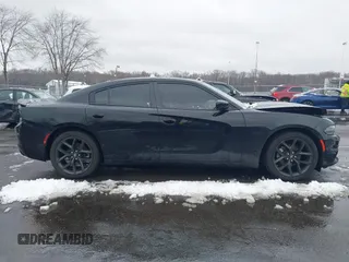 2022 Dodge Charger SXT with VIN 2C3CDXBG0NH157720, listed as a IAAI auction lot 41559731 with 21,062 mi miles and . Bid and sale history available at carsss.com. Image 13.