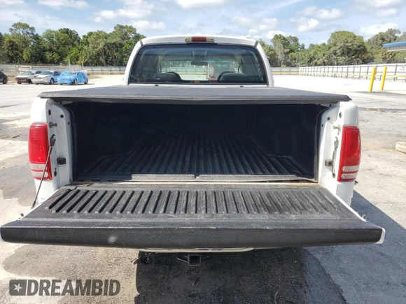 2001 Dodge Dakota Sport z VIN 1B7GL2AN51S192405, wystawiony jako Copart lot #51256284 z przebiegiem 161 387 mil mil oraz Szkoda całkowita • Salvage title. Historia ofert i sprzedaży dostępna na DreamBid. Obrazek 6.
