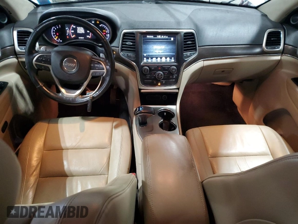 2014 Jeep Grand Cherokee Limited with VIN 1C4RJFBG1EC140601, listed as a Copart auction lot 56298305 with 131,193 mi miles and Salvage title. Bid and sale history available at DreamBid. Image 8.